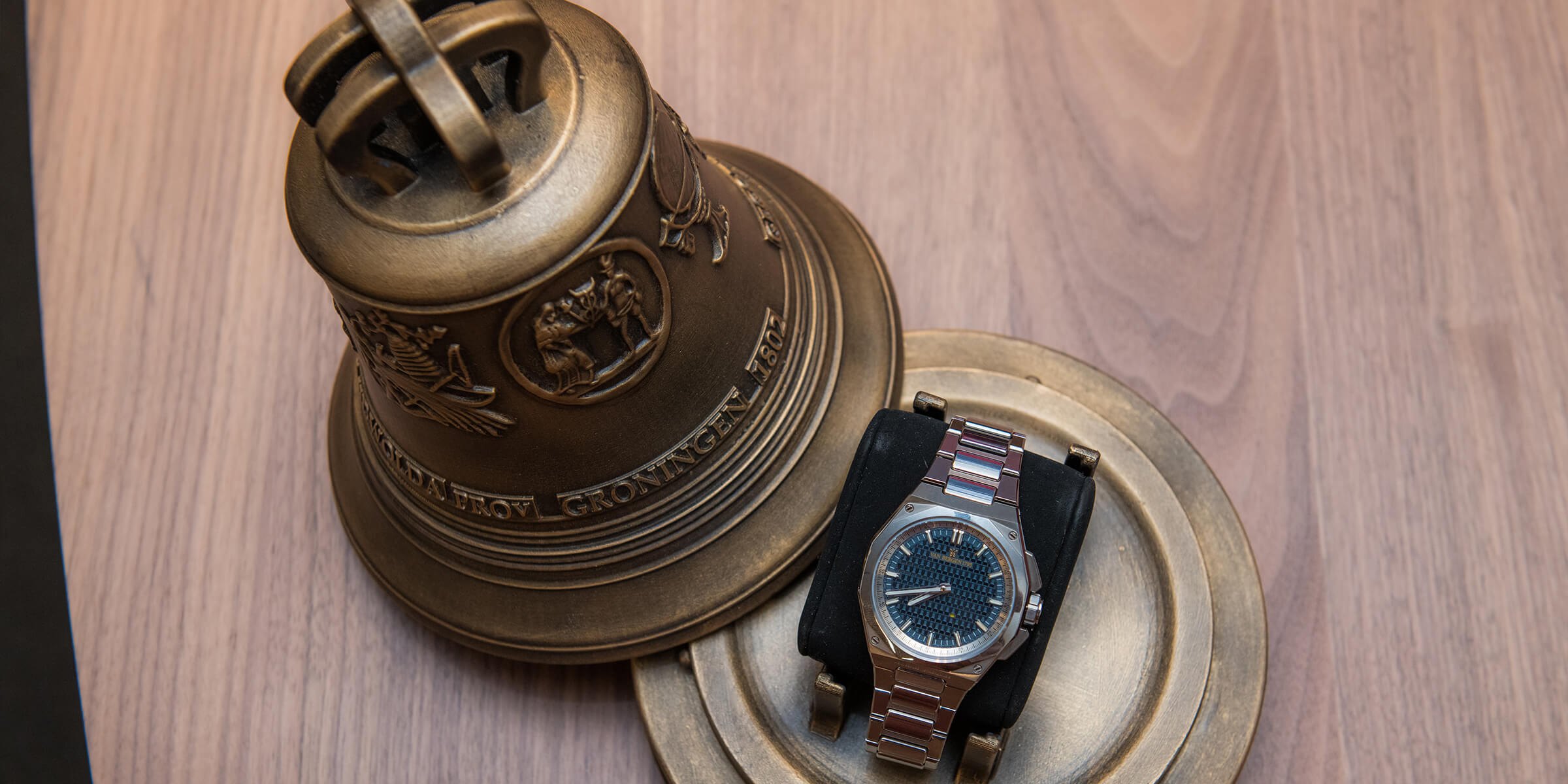 A Van Bergen bell, opened, with the Heero Bourdon Blue resting in its base